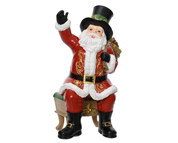 Figur "Weihnachtsmann auf Bank" (24cm)